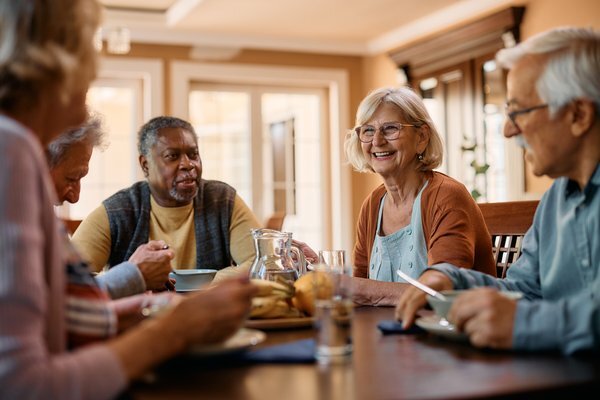 senior-communities-senior-friends-enjoying-coffee-together